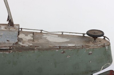 A large clockwork tinplate four funnel boat, probably German circa 1910 - 2