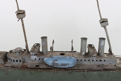 A large clockwork tinplate four funnel boat, probably German circa 1910 - 3