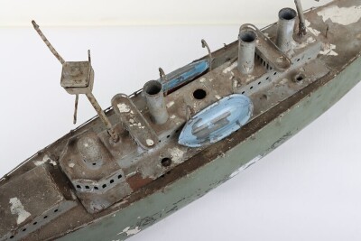 A large clockwork tinplate four funnel boat, probably German circa 1910 - 6