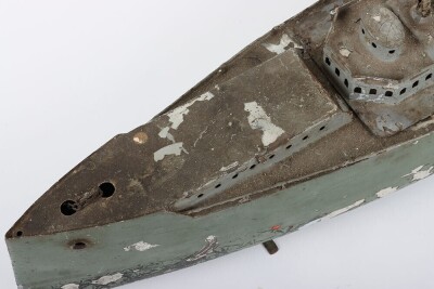A large clockwork tinplate four funnel boat, probably German circa 1910 - 7