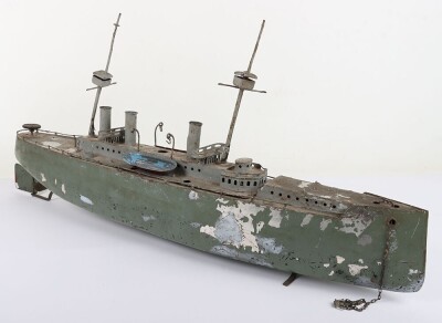 A large clockwork tinplate four funnel boat, probably German circa 1910 - 8