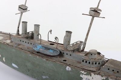 A large clockwork tinplate four funnel boat, probably German circa 1910 - 9