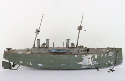 A large clockwork tinplate four funnel boat, probably German circa 1910 - 10