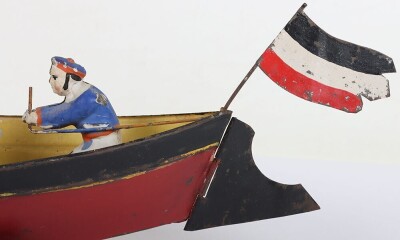 Interesting hand painted tinplate rowing boat floor toy, German circa 1900 - 2