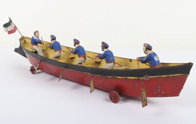 Interesting hand painted tinplate rowing boat floor toy, German circa 1900 - 5