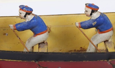 Interesting hand painted tinplate rowing boat floor toy, German circa 1900 - 9