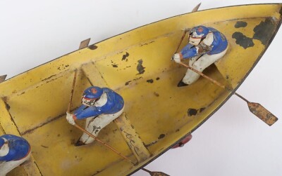 Interesting hand painted tinplate rowing boat floor toy, German circa 1900 - 10