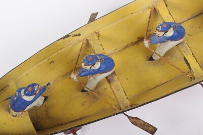 Interesting hand painted tinplate rowing boat floor toy, German circa 1900 - 11