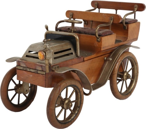 A cast metal and wooden De Dion four seat motor car smokers companion, circa 1905