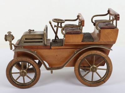 A cast metal and wooden De Dion four seat motor car smokers companion, circa 1905 - 6