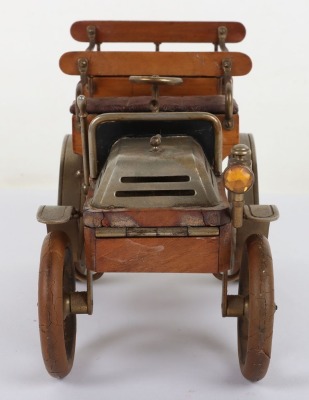 A cast metal and wooden De Dion four seat motor car smokers companion, circa 1905 - 8