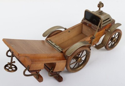 A cast metal and wooden De Dion four seat motor car smokers companion, circa 1905 - 12