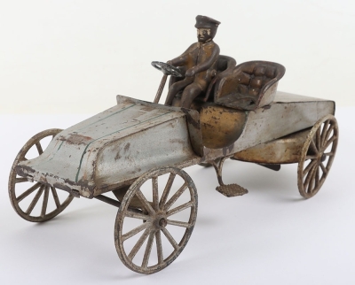 Interesting tinplate clockwork two-seater Racer with cast iron driver, probably American circa 1905