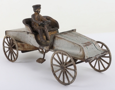 Interesting tinplate clockwork two-seater Racer with cast iron driver, probably American circa 1905 - 4