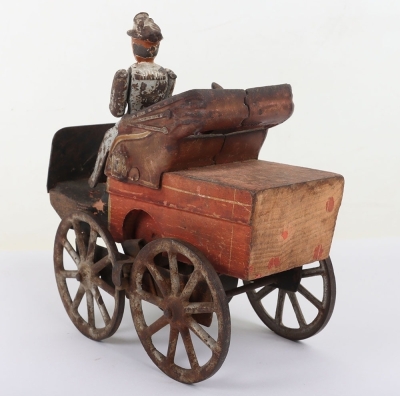 Wooden and cast iron flywheel driven early motorcar, American circa 1903 - 4
