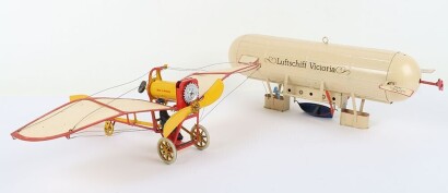 Modern tinplate clockwork Airship and Monoplane