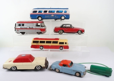Four Japanese Battery-Operated Tinplate Vehicles