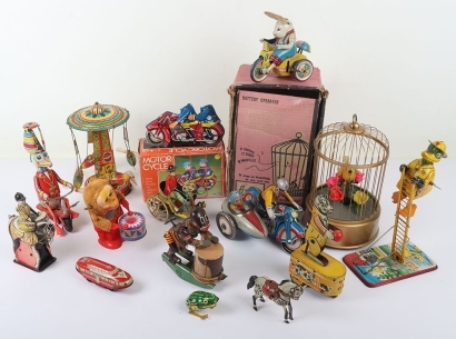 A Quantity of Tinplate Battery/Clockwork Operated Novelty Toys