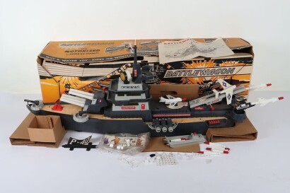 A boxed battery operated Battlewagon toy gun ship, 1960s, made by the Deluxe Reading corporation in Elizabeth port New Jersey USA