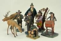 Four rare German hand painted carved wooden figures of Huntsmen and Travelling Musicians, circa 1870,