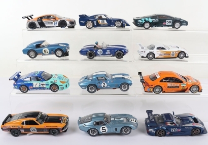 Twelve Unboxed Slot Cars