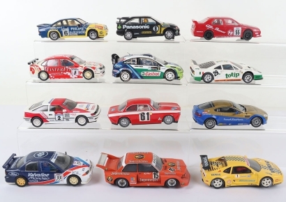 Twelve Unboxed Slot Cars