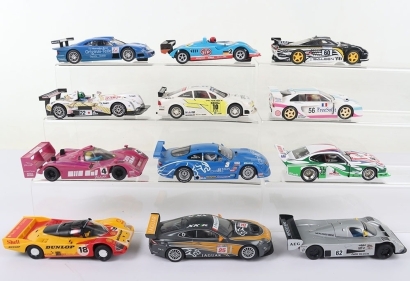 Twelve Unboxed Slot Cars