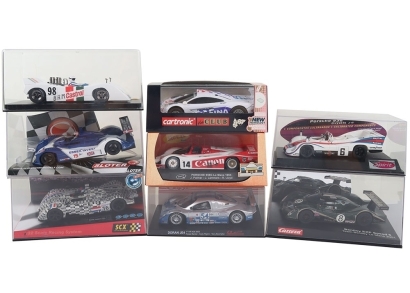Eight Boxed Slot Car Models