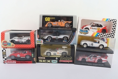 Eight Boxed Slot Car Models