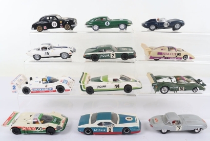 Twelve Unboxed Jaguar Slot Cars