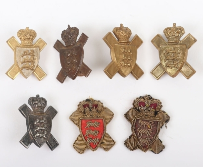 Grouping of Victorian Royal Jersey Light Infantry Collar / Forage Cap Badges