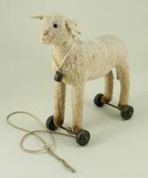 A small Steiff wool plush Lamb on wheels, 1920s,