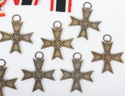 10x Third Reich War Merit Cross 2nd Class Without Swords. All with maker mark &ldquo;15&rdquo; for Friedrick Orth and in generally good condition, with many having the bronze finish preserved. With some additional ribbons added. - 5