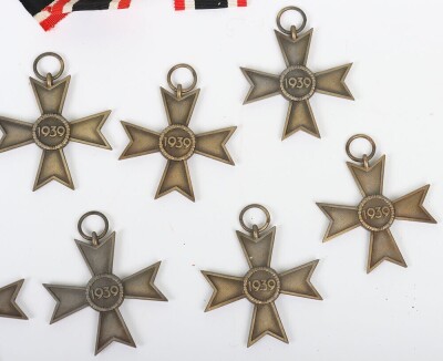 10x Third Reich War Merit Cross 2nd Class Without Swords. All with maker mark &ldquo;15&rdquo; for Friedrick Orth and in generally good condition, with many having the bronze finish preserved. With some additional ribbons added. - 8