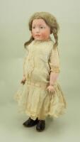 Kammer & Reinhardt 109 bisque head character doll, in original clothes, German circa 1909,