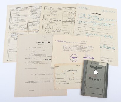 WW2 German Wehrpass and Small Group of Documents to Obergefr. G. Ludwig, Grenadier-Regiment 982, Wounded in Normandy August 1944