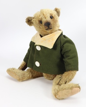 A Steiff brown mohair centre seam Teddy bear with button, German circa 1909