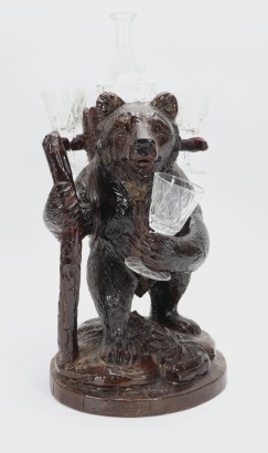 A Black Forest carved wooden bear decanter stand, late 19th early 20th century,