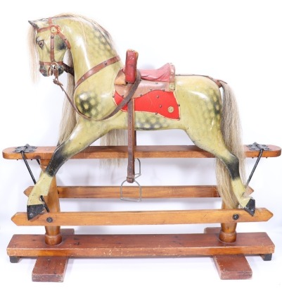 A good Victorian F.H Ayres carved wooden Rocking Horse,