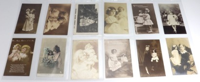 Collection of twelve Edwardian postcards of young Girls with Dolls,