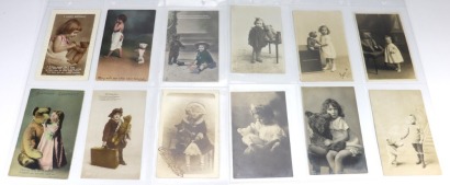 Collection of twelve Edwardian postcards of young Children with their Teddy Bears,