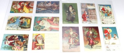 Collection of twelve Edwardian Santa Claus postcards,