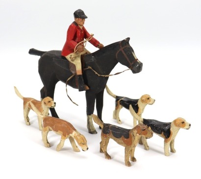 Forest Toys of Brockenhurst carved wooden Huntsman and hounds, circa 1930,
