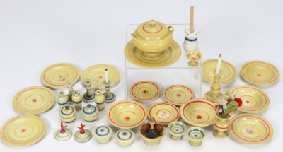 A collection of painted wooden tableware, German mid nineteenth century