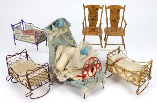 Four miniature painted metal dolls house beds and two chairs, German, 19th century