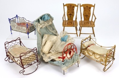 Four miniature painted metal dolls house beds and two chairs, German, 19th century