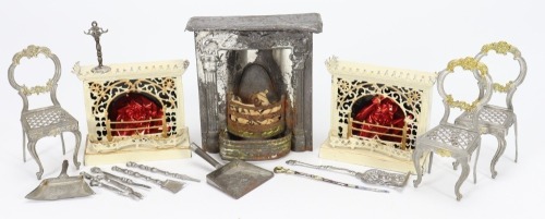 A pair of miniature painted cream tin-plate fire-places for dolls house, German circa 1860-70
