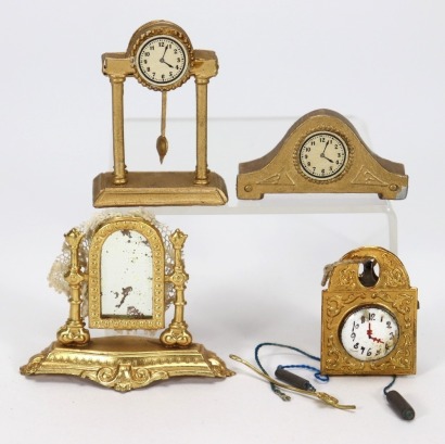 Three gold gilt miniature dolls house clocks and swing mirror, German 1880s,