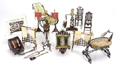 A collection of miniature soft metal dolls house furniture, German 1880s-90s