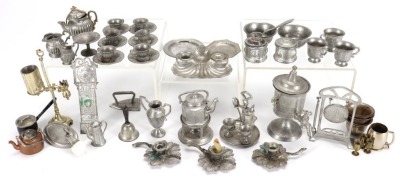 Collection of miniature pewter dolls house accessories, German 1880s